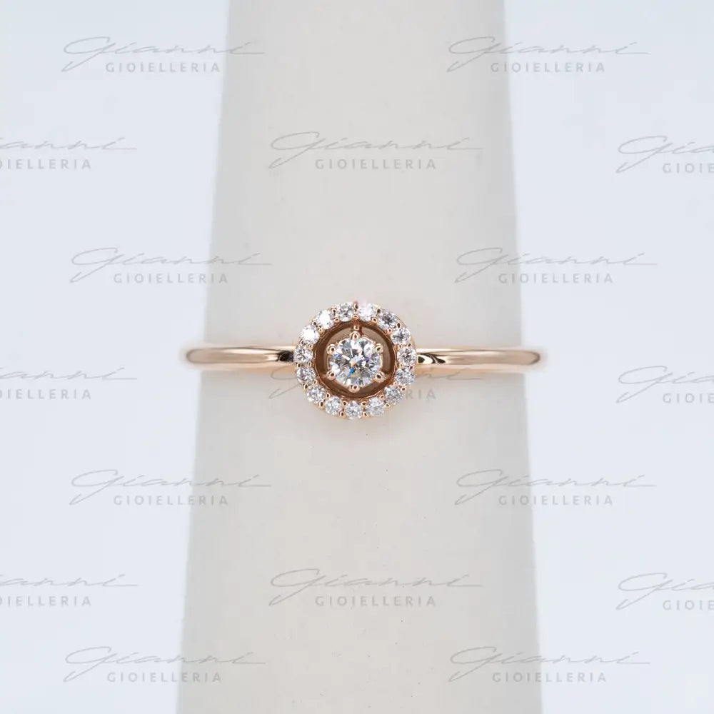 Anello Crivelli - Oro rosa con Diamante centrale e contorno di diamanti Anelli