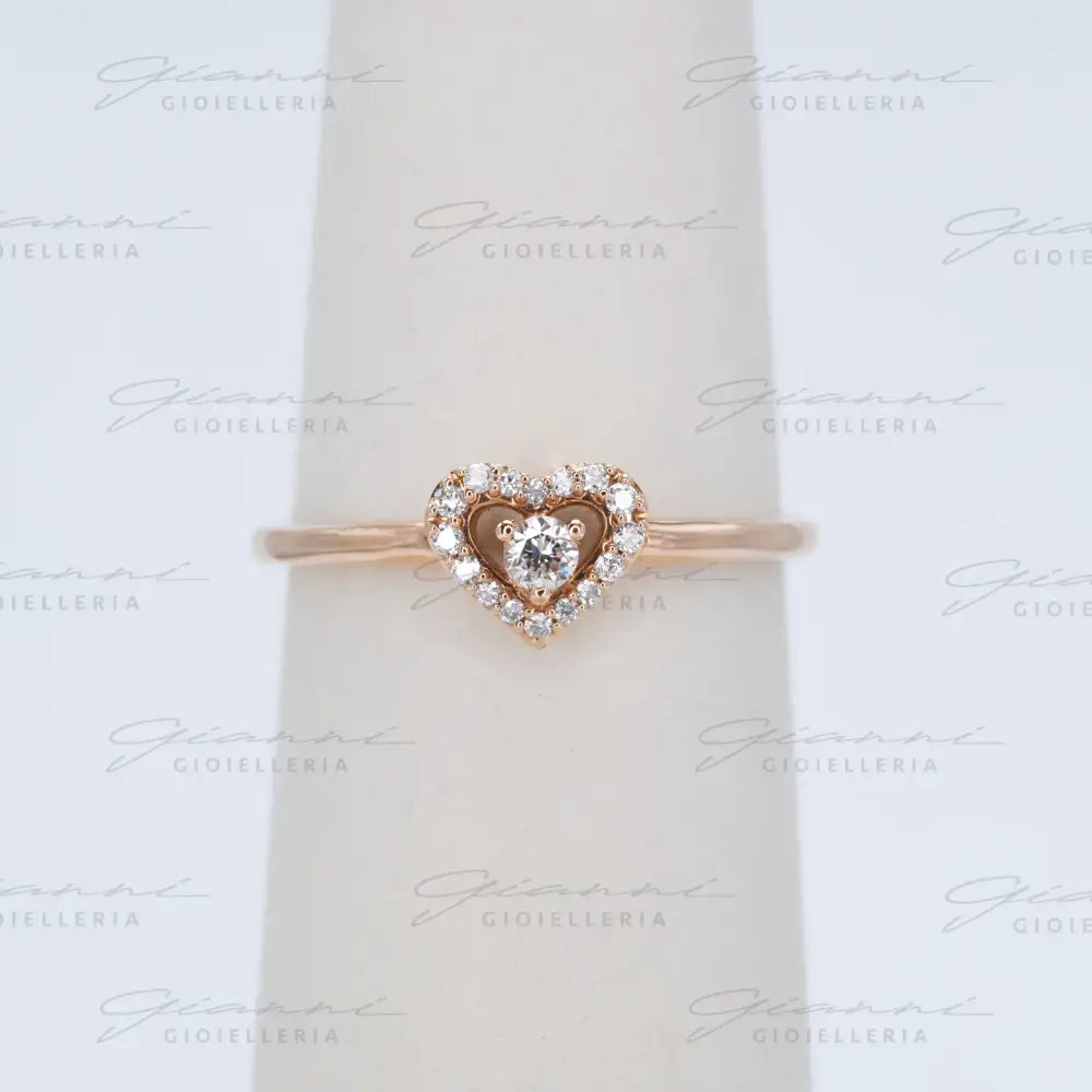 Anello Crivelli - Oro rosa con diamante centrale e contorno di diamanti Anelli