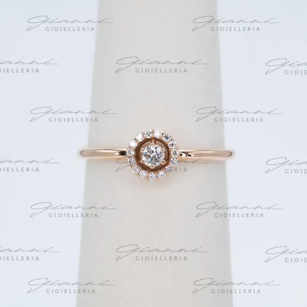 Anello Crivelli - Oro Rosa con Diamante centrale e contorno di Diamanti Anelli