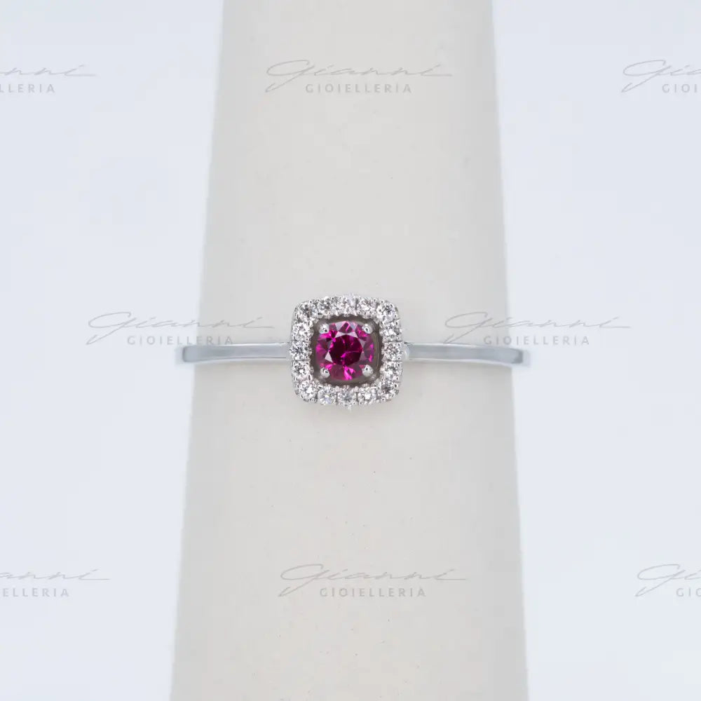 Anello Crivelli - Rubino centrale e contorno di diamanti Anelli