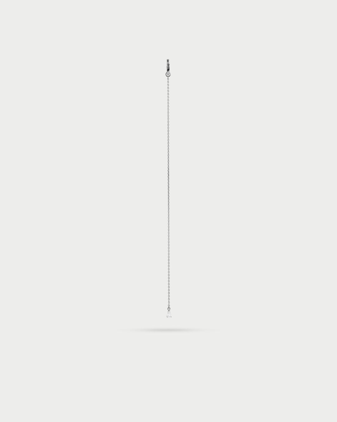 Mono-orecchino long line drop rodio