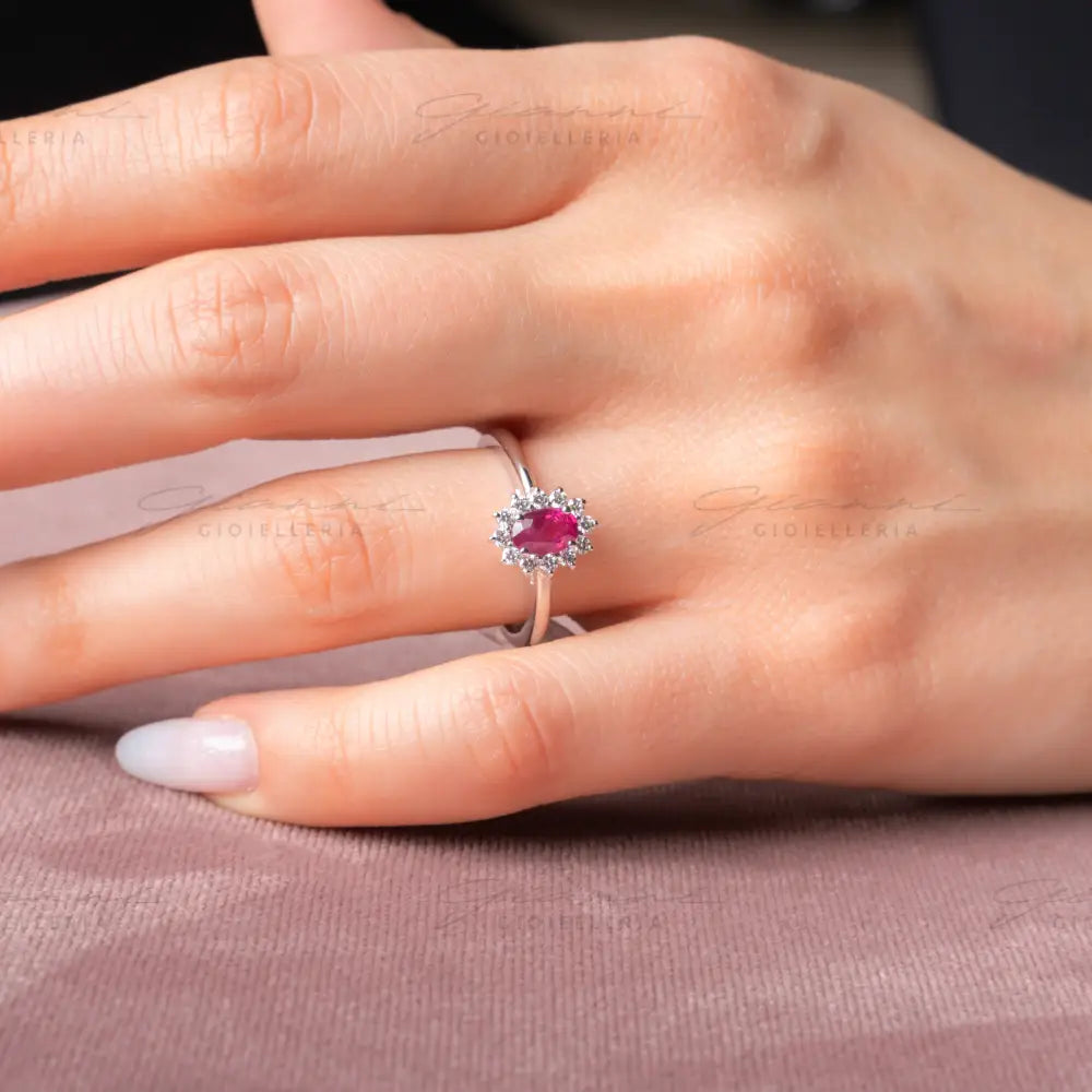 Anello Crivelli - Rubino taglio ovale ct. 0,68 e diamanti Anelli