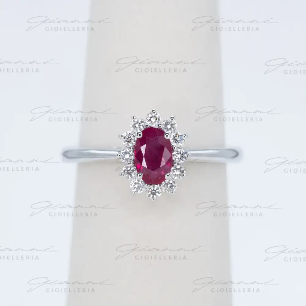 Anello Crivelli - Rubino taglio ovale ct. 0,68 e diamanti Anelli