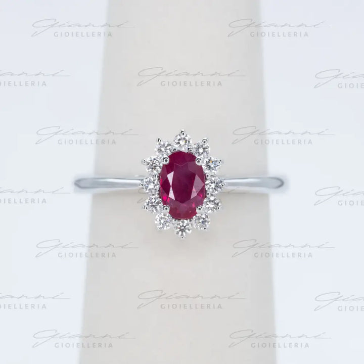 Anello Crivelli - Rubino taglio ovale ct. 0,68 e diamanti Anelli