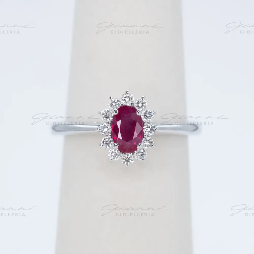 Anello Crivelli - Rubino taglio ovale ct. 0,68 e diamanti Anelli