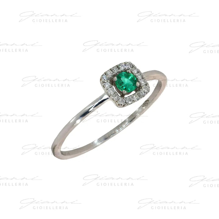 Anello Crivelli - Smeraldo centrale e contorno di Diamanti in Oro Bianco Anelli