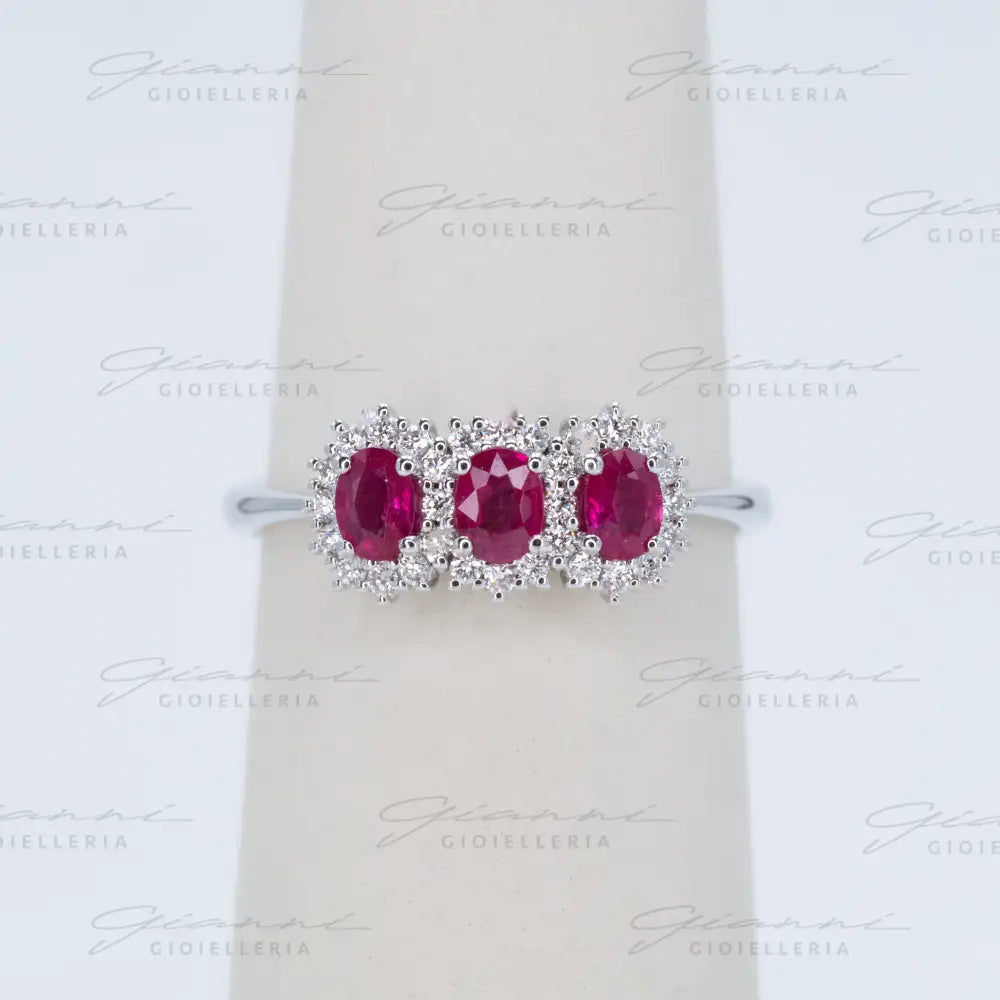 Anello Crivelli - Trilogy con Rubini taglio ovale ct. 0,48 e diamanti Anelli
