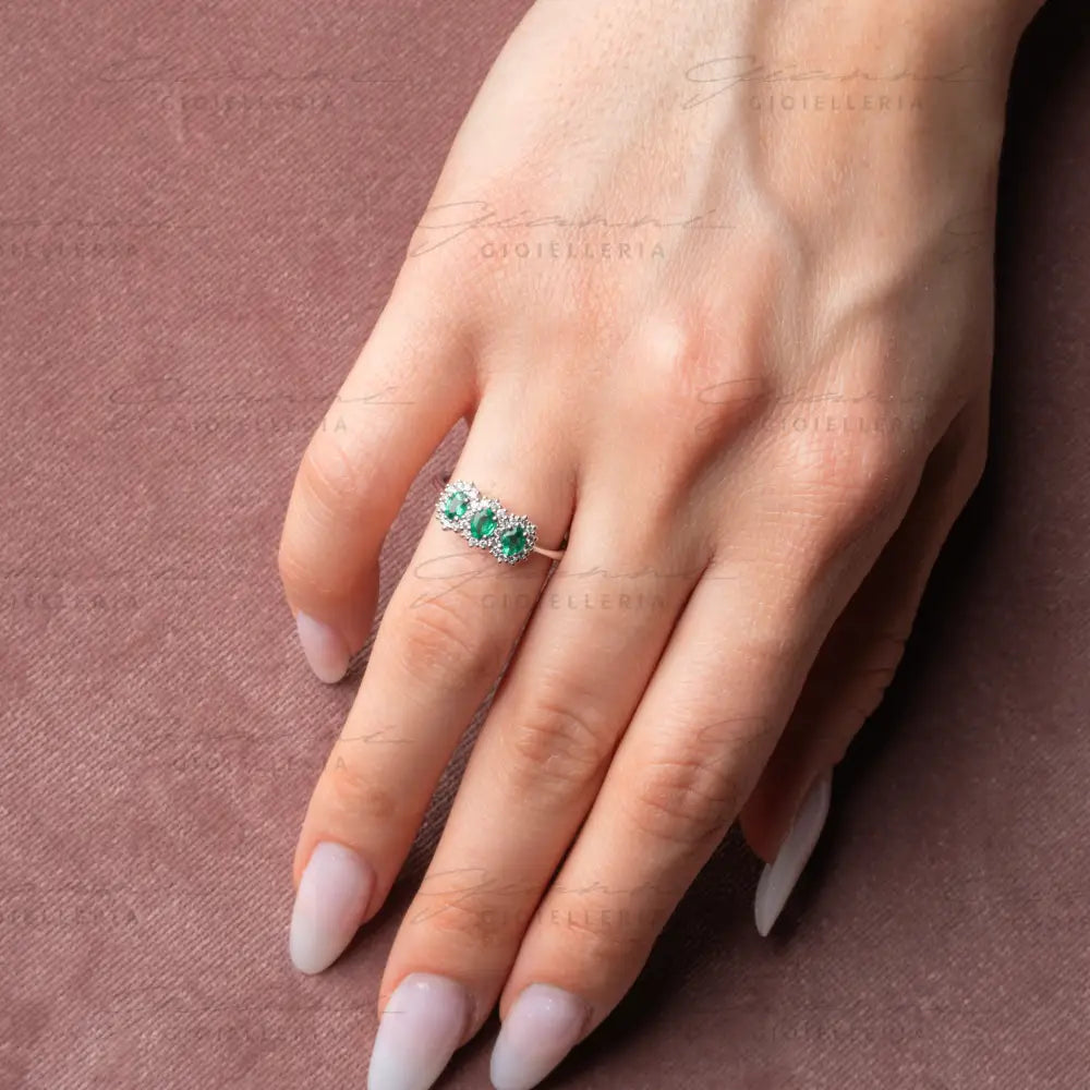 Anello Crivelli - Trilogy con Smeraldi taglio ovale ct. 0,38 e diamanti Anelli