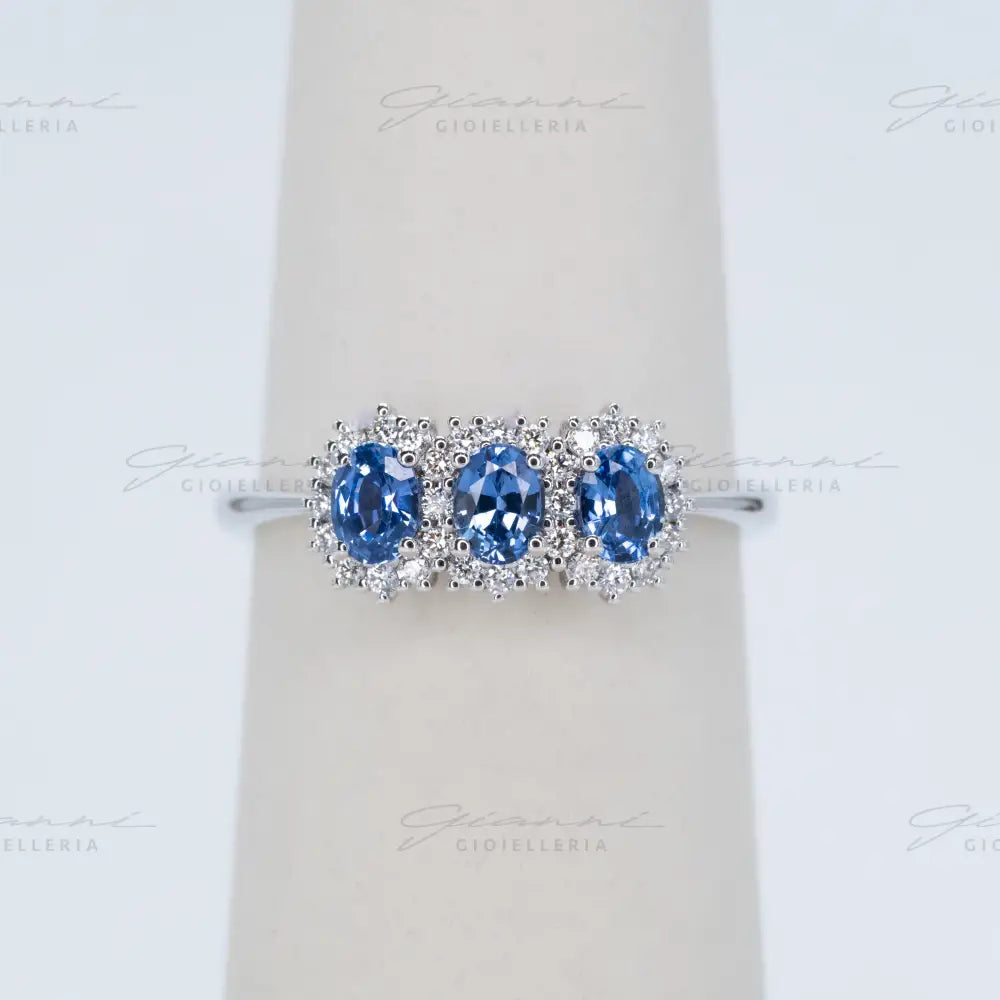 Anello Crivelli - Trilogy con Zaffiri blu taglio ovale ct. 0,72 e diamanti Anelli