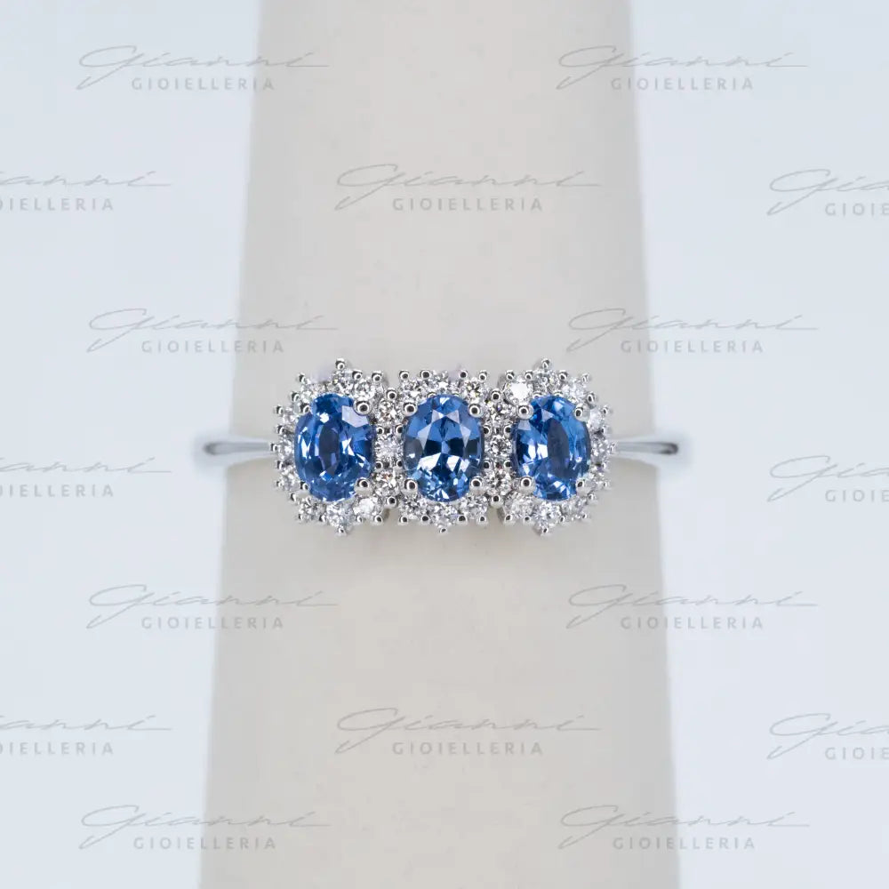 Anello Crivelli - Trilogy con Zaffiri blu taglio ovale ct. 0,72 e diamanti Anelli