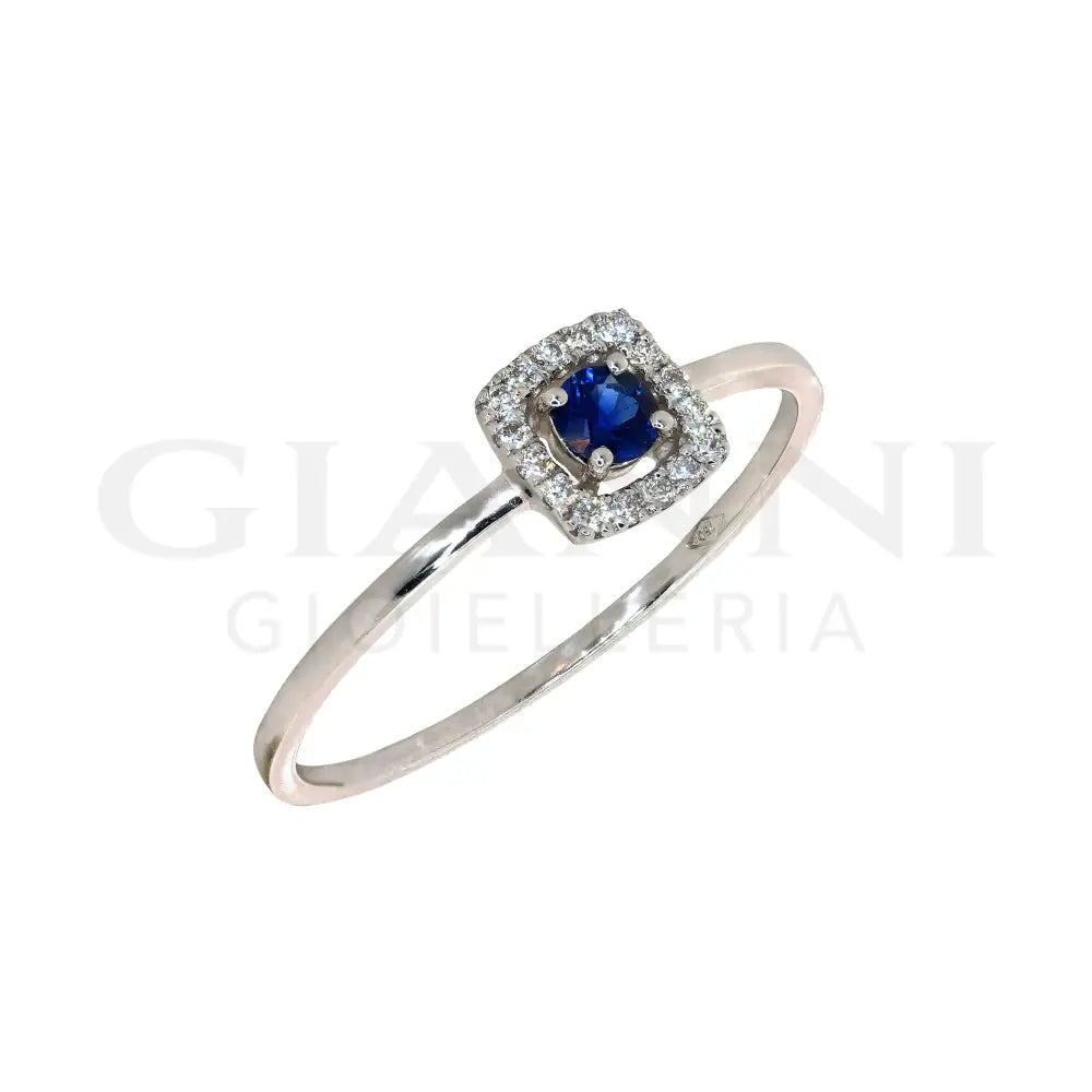 Anello Crivelli - Zaffiro centrale e contorno di Diamanti in Oro Bianco Anelli