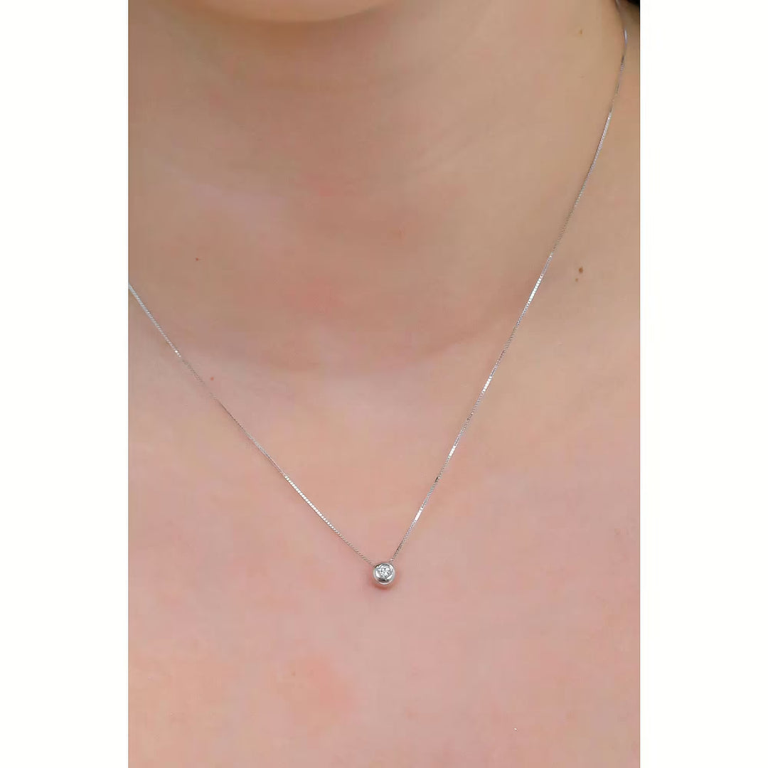 Girocollo Comete - Punto Luce in Oro Bianco e Diamante 0,05 ct.